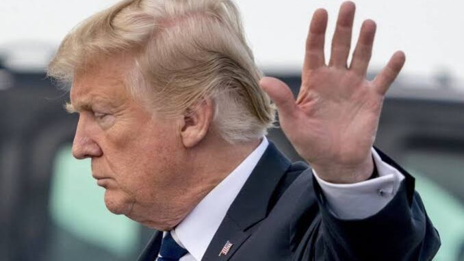 Side profile of a man raising his hand. Side profile of a man raising his hand.