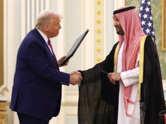 Donald Trump shaking hands with a Saudi royal in traditional attire.