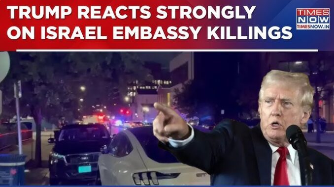 A news reporter covers the strong reaction to the Israel embassy killing with emergency lights in the background.