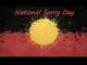 Abstract art with a yellow circle and red background, titled National Sorry Day.