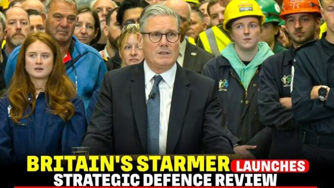 Man giving a speech at a formal event with attentive audience behind him. Man giving a speech at a formal event with attentive audience behind him.