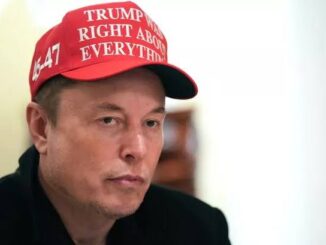 A man wearing a red 'Trump Right About Everything' hat.