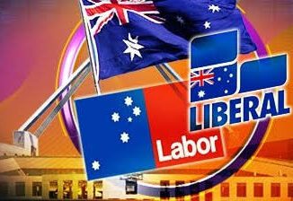 Australian election campaign signs for Labor and Liberal parties.