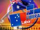 Australian election campaign signs for Labor and Liberal parties.
