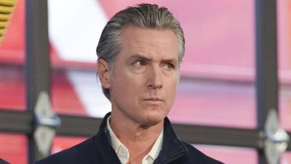 Portrait of a serious man with gray hair and a collared shirt. Portrait of a serious man with gray hair and a collared shirt.