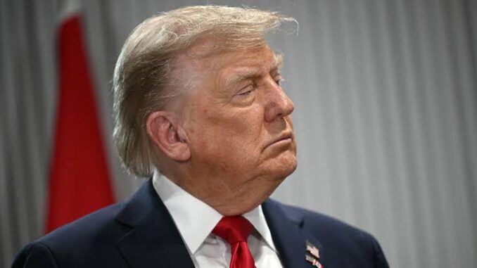 Profile of a serious man in a suit and red tie. Profile of a serious man in a suit and red tie.