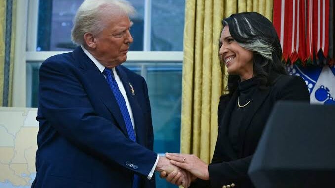 Two people shaking hands in a formal setting, smiling. Two people shaking hands in a formal setting, smiling.