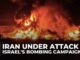 Intense fire and smoke engulf a scene amid an attack during Israel's bombing campaign.