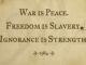 A parchment with a contrasting slogan about war, freedom, and ignorance.