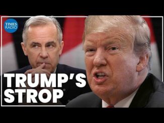 Close-up of Donald Trump and another man with the text 'Trump's Entrop'.