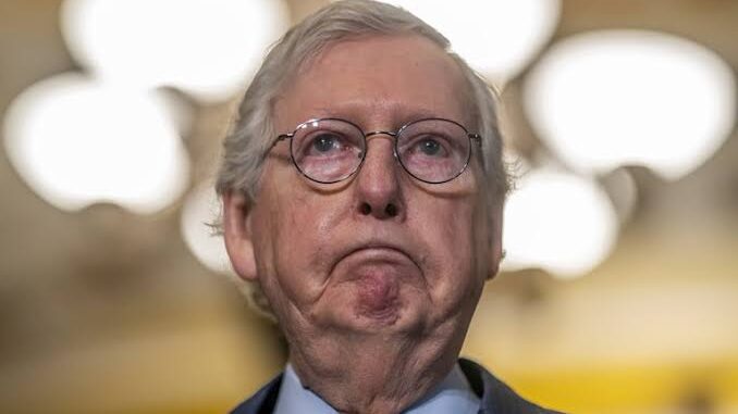 An older man with glasses making a disapproving face. An older man with glasses making a disapproving face.