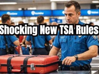 TSA officer inspecting a traveler's suitcase at the airport security checkpoint.