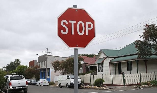 Stop sign on a suburban street corner. Stop sign on a suburban street corner.