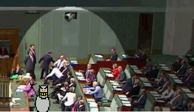 Parliament scene with comedic cartoon cat overlay.