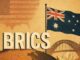 BRICS text with Australian flag background.