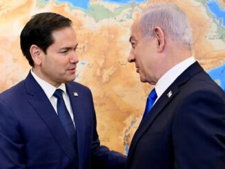 Two men in suits shaking hands.