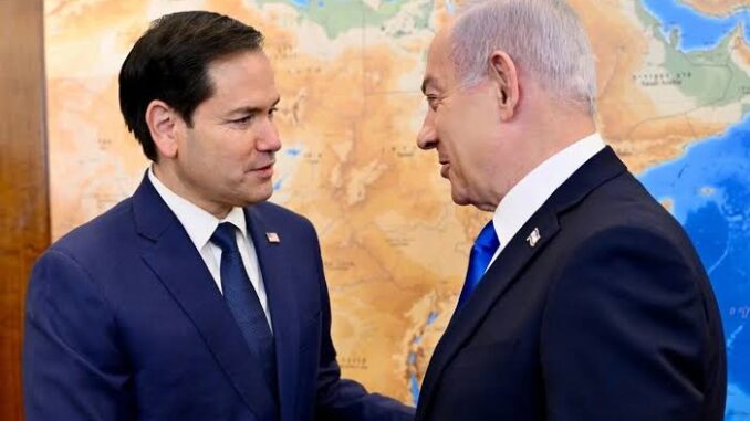 Two men in suits shaking hands.