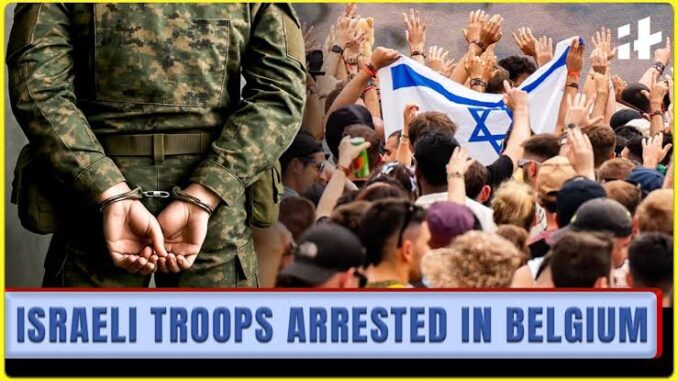 Israeli troops arrested, crowd holding flag. Israeli troops arrested, crowd holding flag.