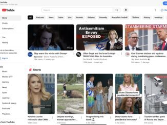 YouTube homepage with video thumbnails and shorts.