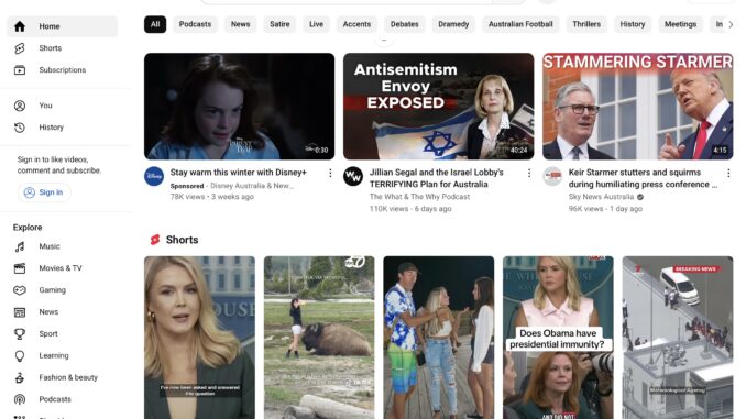 YouTube homepage with video thumbnails and shorts.
