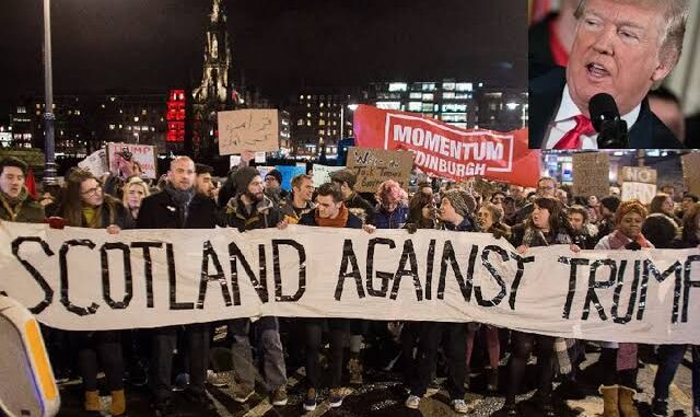 Protest in Scotland against Trump at night.