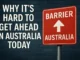 Barrier sign with text about Australia challenges.