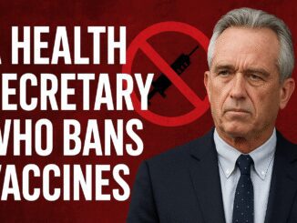 Man in suit with anti-vaccine symbol.