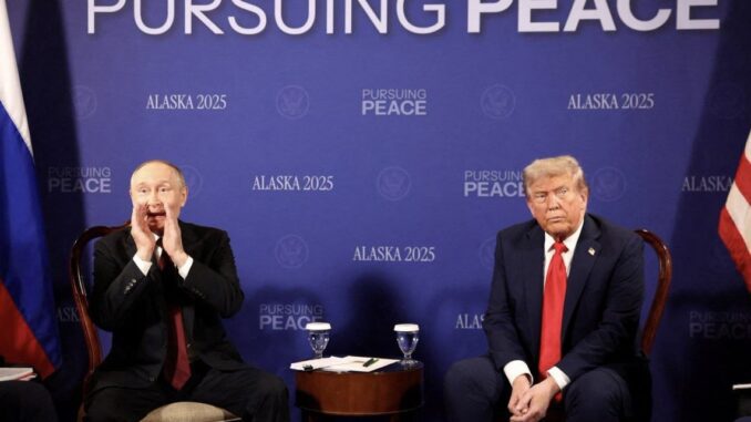 Two men seated at "Pursuing Peace" event. Two men seated at "Pursuing Peace" event.