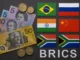BRICS flags with currency and coins.