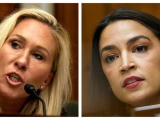 Two women speaking at a public event.