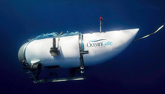 Submersible underwater with OceanGate logo visible. Submersible underwater with OceanGate logo visible.