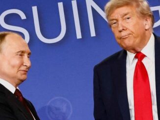 Two men in suits with blue background.