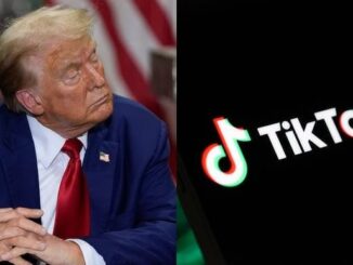 Man looking at TikTok logo on screen.