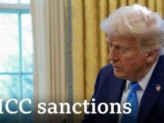 Man in suit with "ICC sanctions" text.