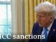 Man in suit with "ICC sanctions" text.