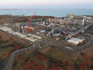 Industrial plant near the coast, aerial view.