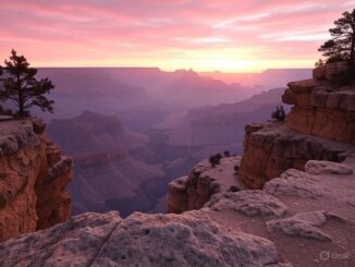 Grand Canyon sunrise with colorful sky.