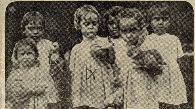 Children holding toys, seeking adoptive homes. Children holding toys, seeking adoptive homes.