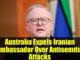 Man speaking, headline about diplomatic expulsion.