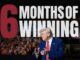 Person clapping with "6 Months of Winning".
