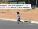 Child running on a rural road.