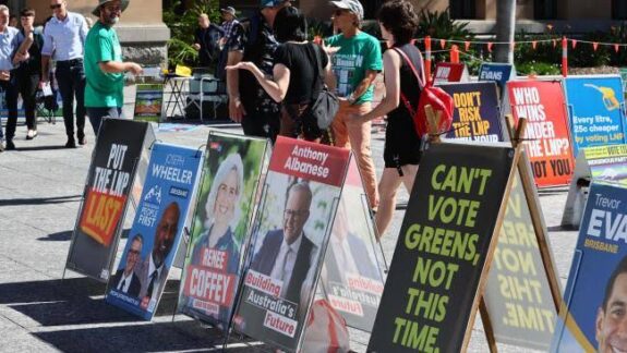 Political campaign posters displayed outdoors. Political campaign posters displayed outdoors.