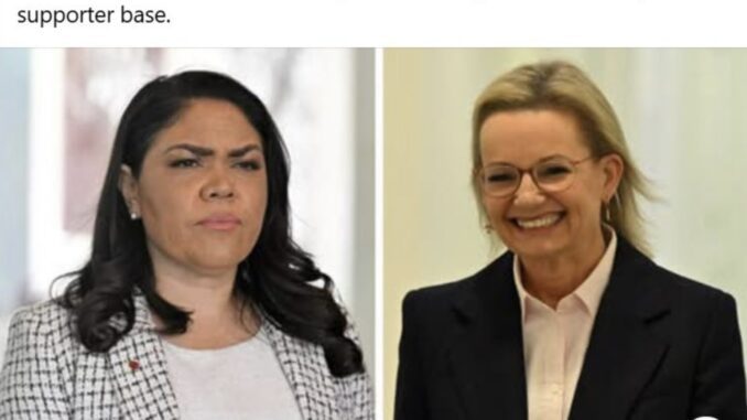 Two women in formal attire, serious expressions. Two women in formal attire, serious expressions.