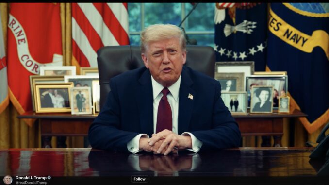 Man at executive desk with framed photographs Man at executive desk with framed photographs