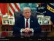 Man at executive desk with framed photographs