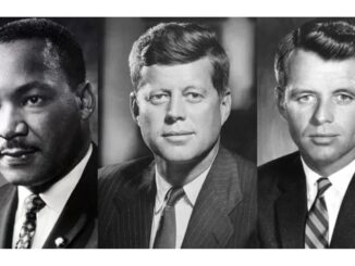 Three men in formal suits, black-and-white portrait.