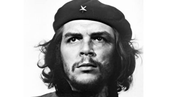 Man wearing beret with star, looking upwards. Man wearing beret with star, looking upwards.