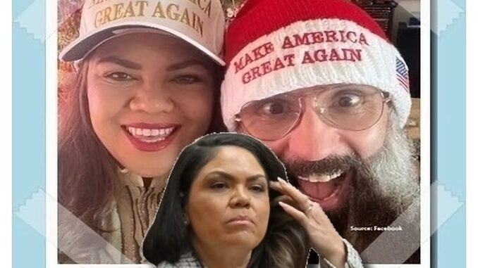 Three people wearing "Make America Great Again" gear. Three people wearing "Make America Great Again" gear.