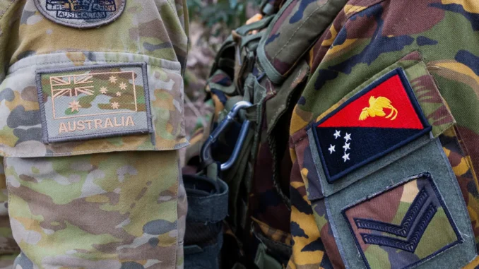 Australian and Papua New Guinean military uniforms.