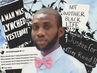 Man with protest signs for justice.
